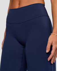 Model wearing Fusion V-Contour High-Rise Petite Pant - Future Navy | Model:Issy | Size:XS | Thumbnail Index: 4