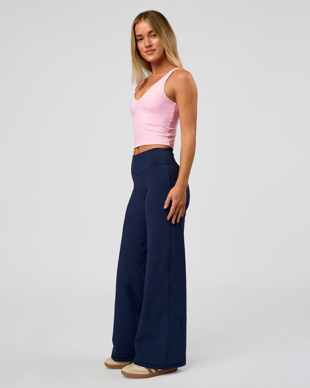 Model wearing Fusion V-Contour High-Rise Petite Pant - Future Navy | Model:Issy | Size:XS - view 9