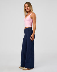 Model wearing Fusion V-Contour High-Rise Petite Pant - Future Navy | Model:Issy | Size:XS | Thumbnail Index: 8