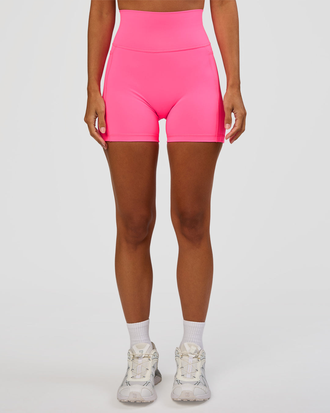 Woman wearing Fusion V-Contour Ultra High-Rise 4” Short Pockets - Sugar Plum | Model:Brylee | Size:XS - view 7