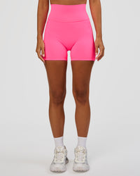 Woman wearing Fusion V-Contour Ultra High-Rise 4” Short Pockets - Sugar Plum | Model:Brylee | Size:XS | Thumbnail Index: 6