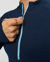 Woman wearing GG AeroFLX+ Long Sleeve Half Zip - Future Navy-Baltic Sea | Model:Grace | Size:XS | Thumbnail Index: 7