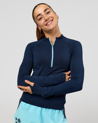 Woman wearing GG AeroFLX+ Long Sleeve Half Zip - Future Navy-Baltic Sea | Model:Grace | Size:XS | Thumbnail Index: 8