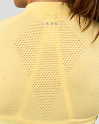 Woman wearing GG AeroFLX+ Long Sleeve Half Zip - Lemon-Baltic Sea | Model:Grace | Size:XS | Thumbnail Index: 7
