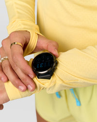 Woman wearing GG AeroFLX+ Long Sleeve Half Zip - Lemon-Baltic Sea | Model:Grace | Size:XS | Thumbnail Index: 4