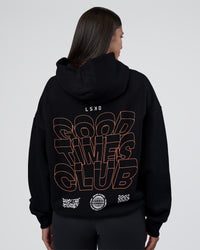 Woman wearing GTC CVC Fleece Unisex Oversized Hoodie - Black-Cantaloupe | Model:Rhiley | Size:XS | Thumbnail Index: 1