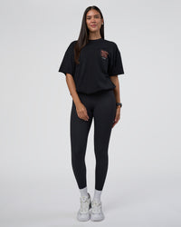 Woman wearing GTC Heavyweight Oversized Tee - Black-Cantaloupe | Model:Rhiley | Size:XS | Thumbnail Index: 6