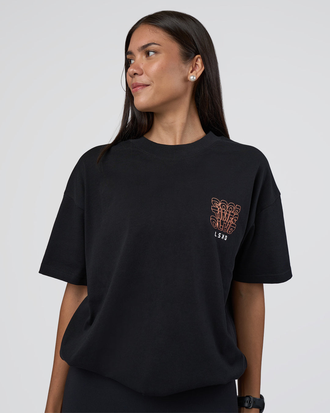 Woman wearing GTC Heavyweight Oversized Tee - Black-Cantaloupe | Model:Rhiley | Size:XS - view 4
