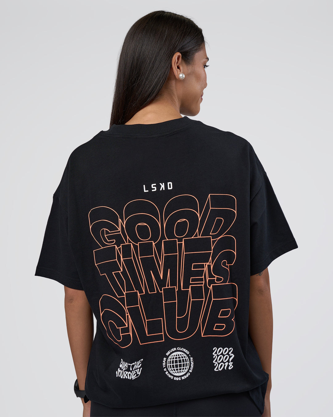 Woman wearing GTC Heavyweight Oversized Tee - Black-Cantaloupe | Model:Rhiley | Size:XS - view 5