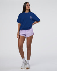 Woman wearing GTC Heavyweight Oversized Tee - Washed Midnight Blue-Marsh | Model:Rhiley | Size:XS | Thumbnail Index: 5