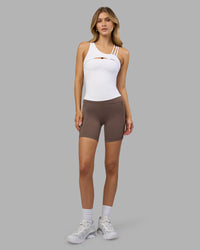 Woman wearing Galvanise Splice Shelf Bra Tank - White | Model:Leilani | Size:XS | Thumbnail Index: 3