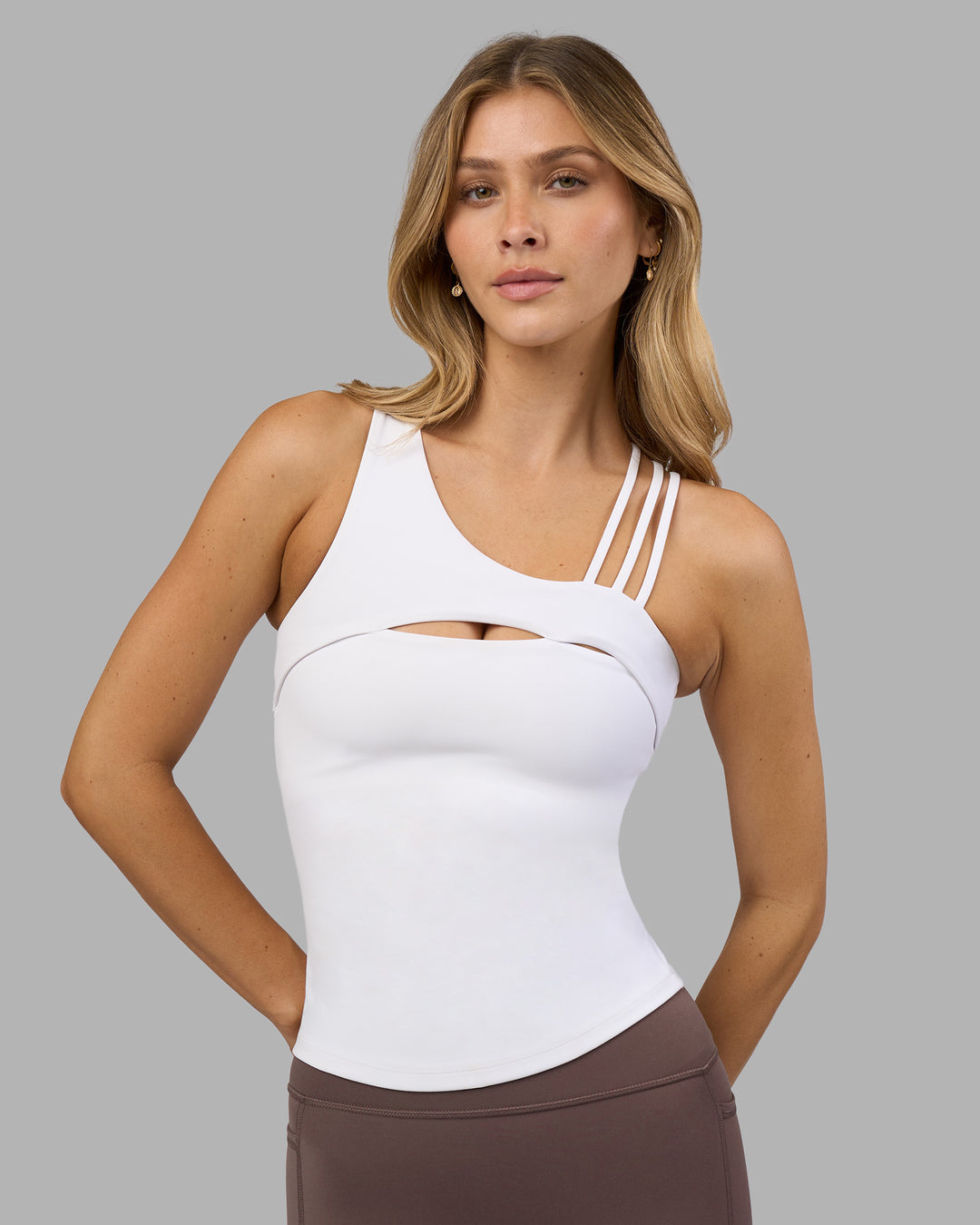 Woman wearing Galvanise Splice Shelf Bra Tank - White | Model:Leilani | Size:XS - view 1