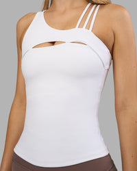 Woman wearing Galvanise Splice Shelf Bra Tank - White | Model:Leilani | Size:XS | Thumbnail Index: 4