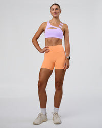 Woman wearing Galvanise Splice Sports Bra - Pale Lilac | Model:Emelia | Size:XS | Thumbnail Index: 5
