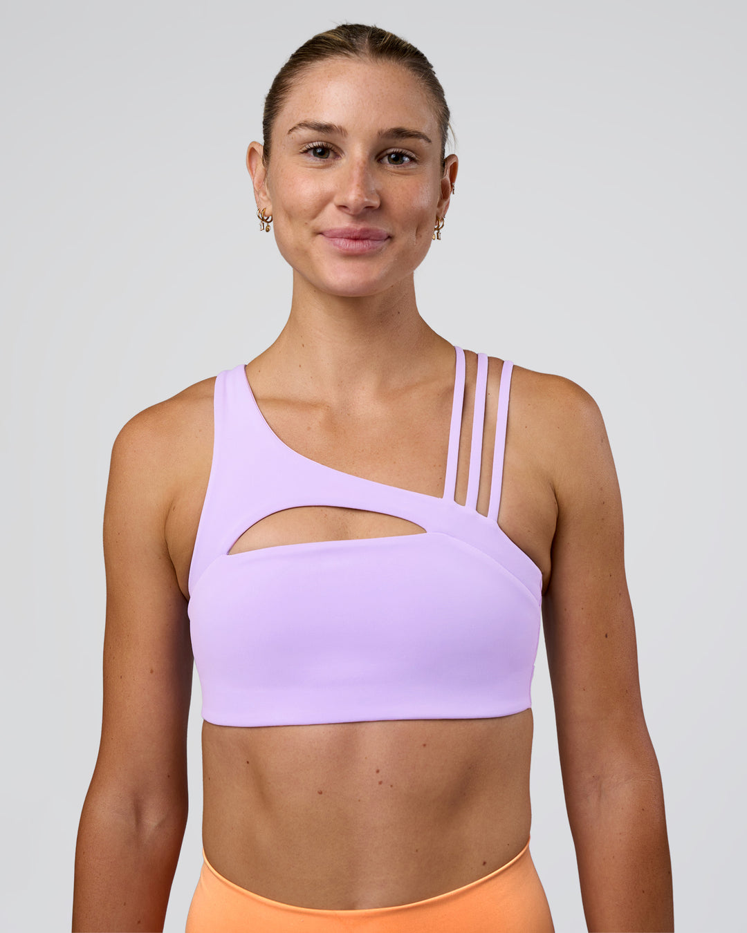 Woman wearing Galvanise Splice Sports Bra - Pale Lilac | Model:Emelia | Size:XS - view 1