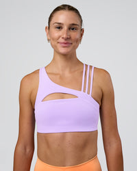 Woman wearing Galvanise Splice Sports Bra - Pale Lilac | Model:Emelia | Size:XS | Thumbnail Index: 0