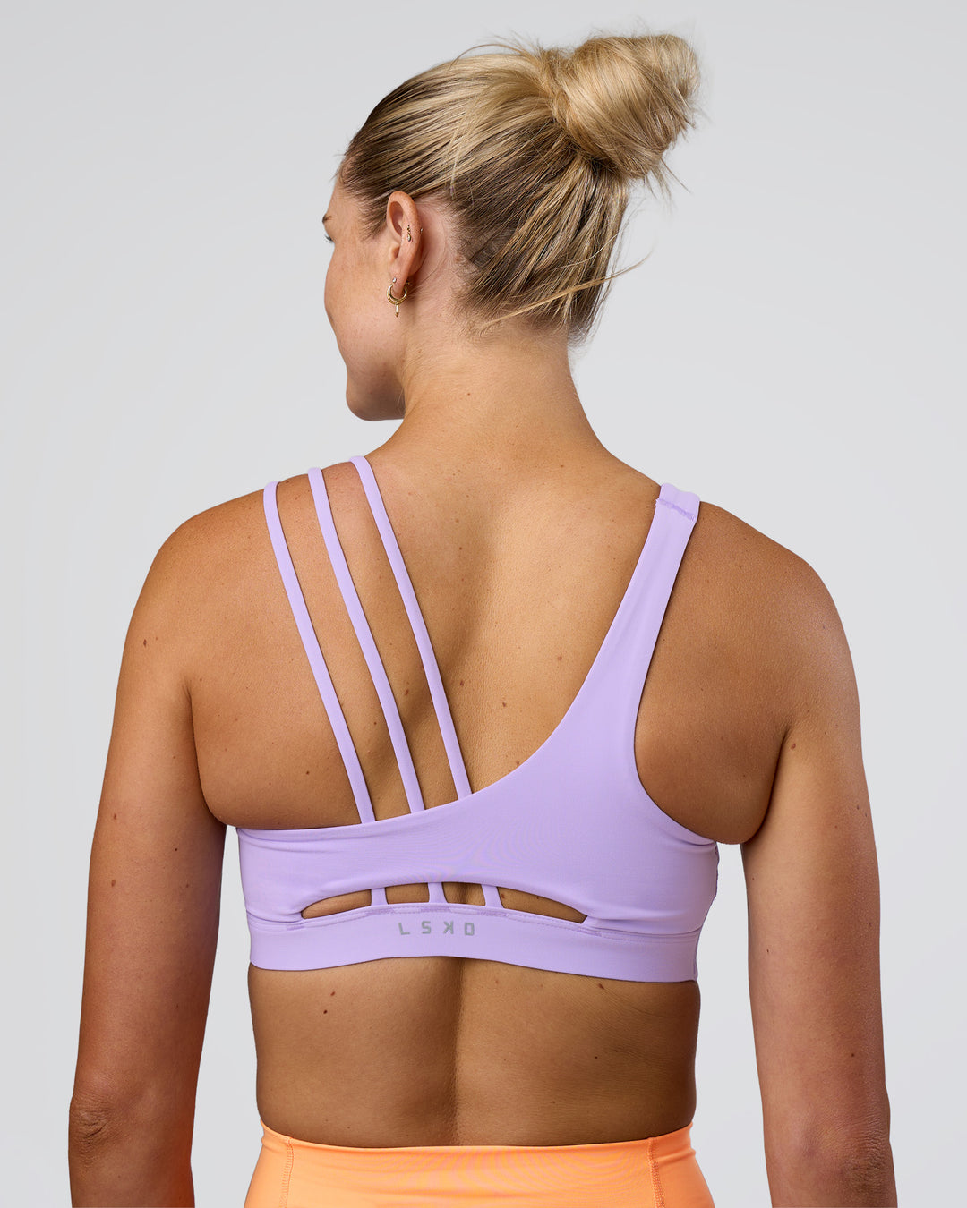 Woman wearing Galvanise Splice Sports Bra - Pale Lilac | Model:Emelia | Size:XS - view 5