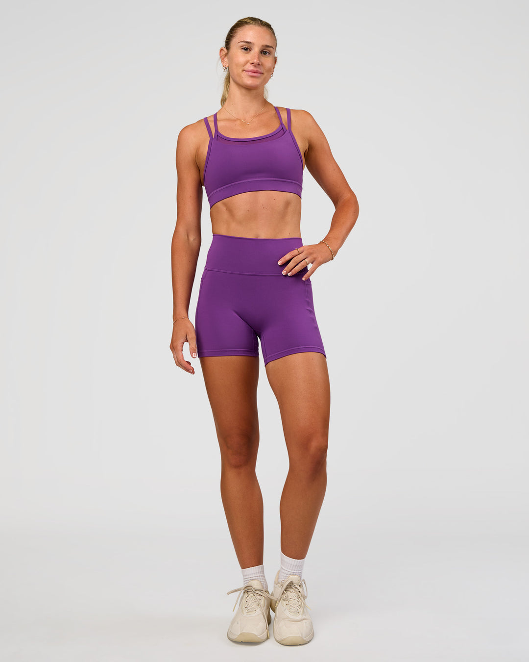 Woman wearing Genesis Layered Sports Bra - Fresh Purple | Model:Emelia | Size:XS - view 5