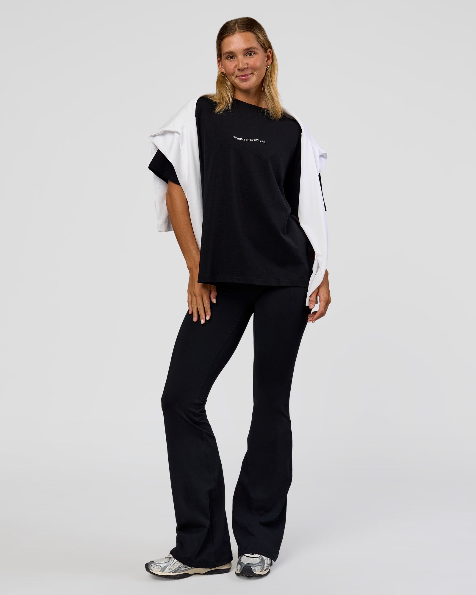 Woman wearing Go-To 1% Better Every Day FLXCotton Oversized Tee - Black-White | Model:Amity | Size:XS