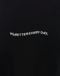 Woman wearing Go-To 1% Better Every Day FLXCotton Oversized Tee - Black-White | Model:Amity | Size:XS | Thumbnail Index: 2