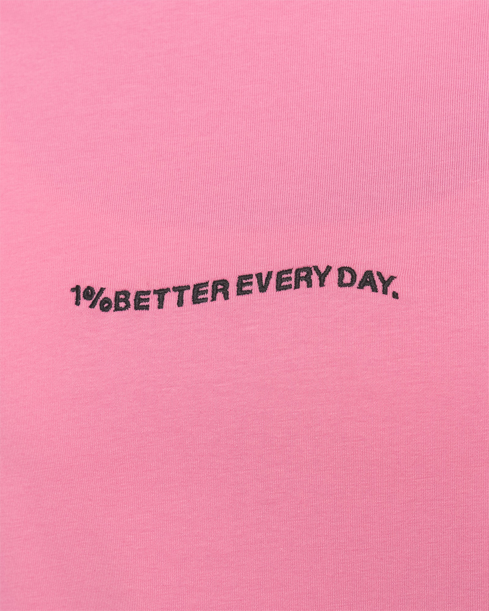 Woman wearing Go-To 1% Better Every Day FLXCotton Oversized Tee - Candy Pink-Black | Model:Amity | Size:XS