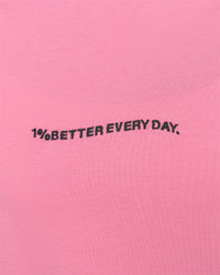 Woman wearing Go-To 1% Better Every Day FLXCotton Oversized Tee - Candy Pink-Black | Model:Amity | Size:XS | Thumbnail Index: 1