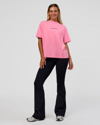 Woman wearing Go-To 1% Better Every Day FLXCotton Oversized Tee - Candy Pink-Black | Model:Amity | Size:XS | Thumbnail Index: 4