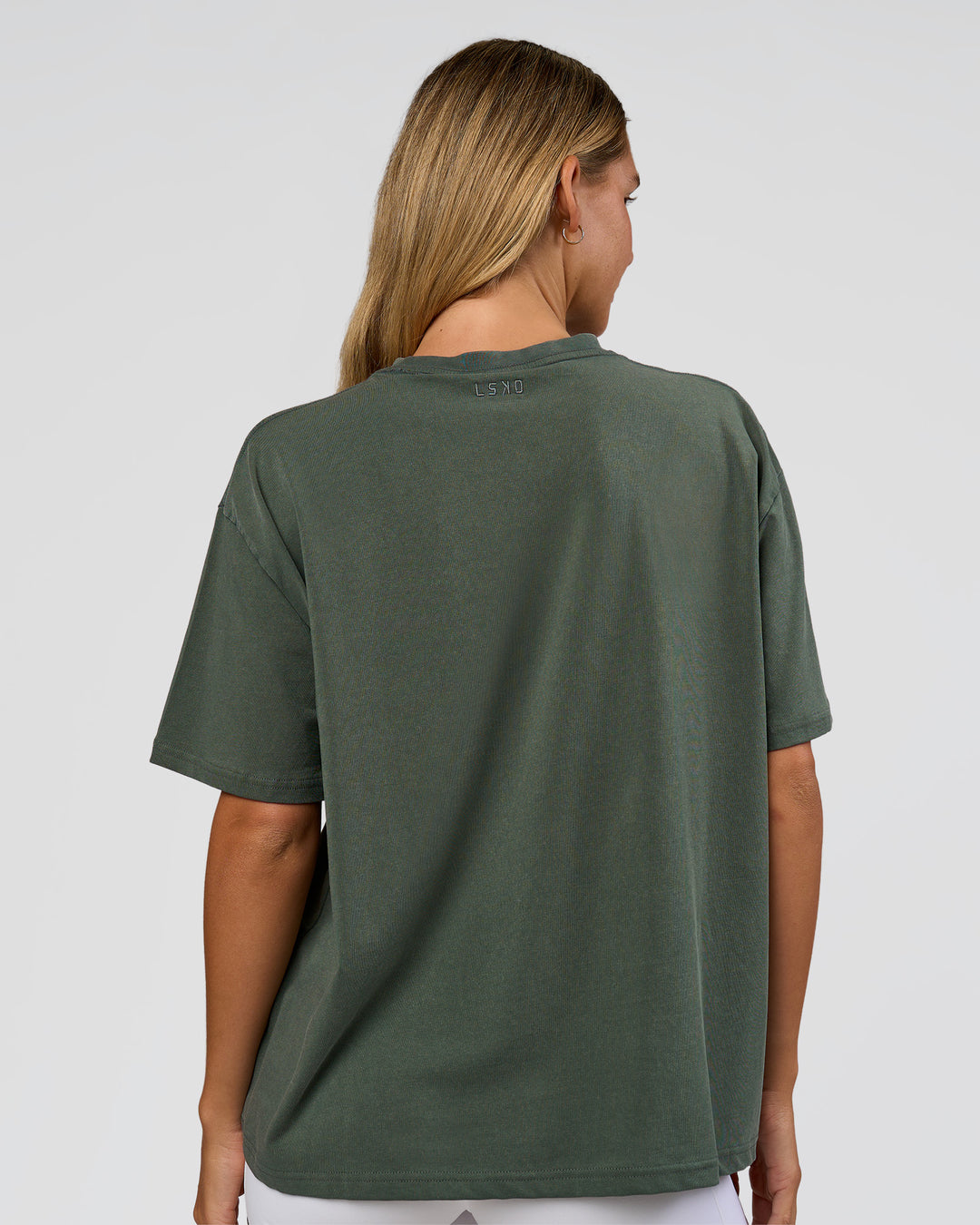 Woman wearing Go-To 1% Better Every Day FLXCotton Oversized Tee - Carbon Green Washed-White | Model:Amity | Size:XS - view 4