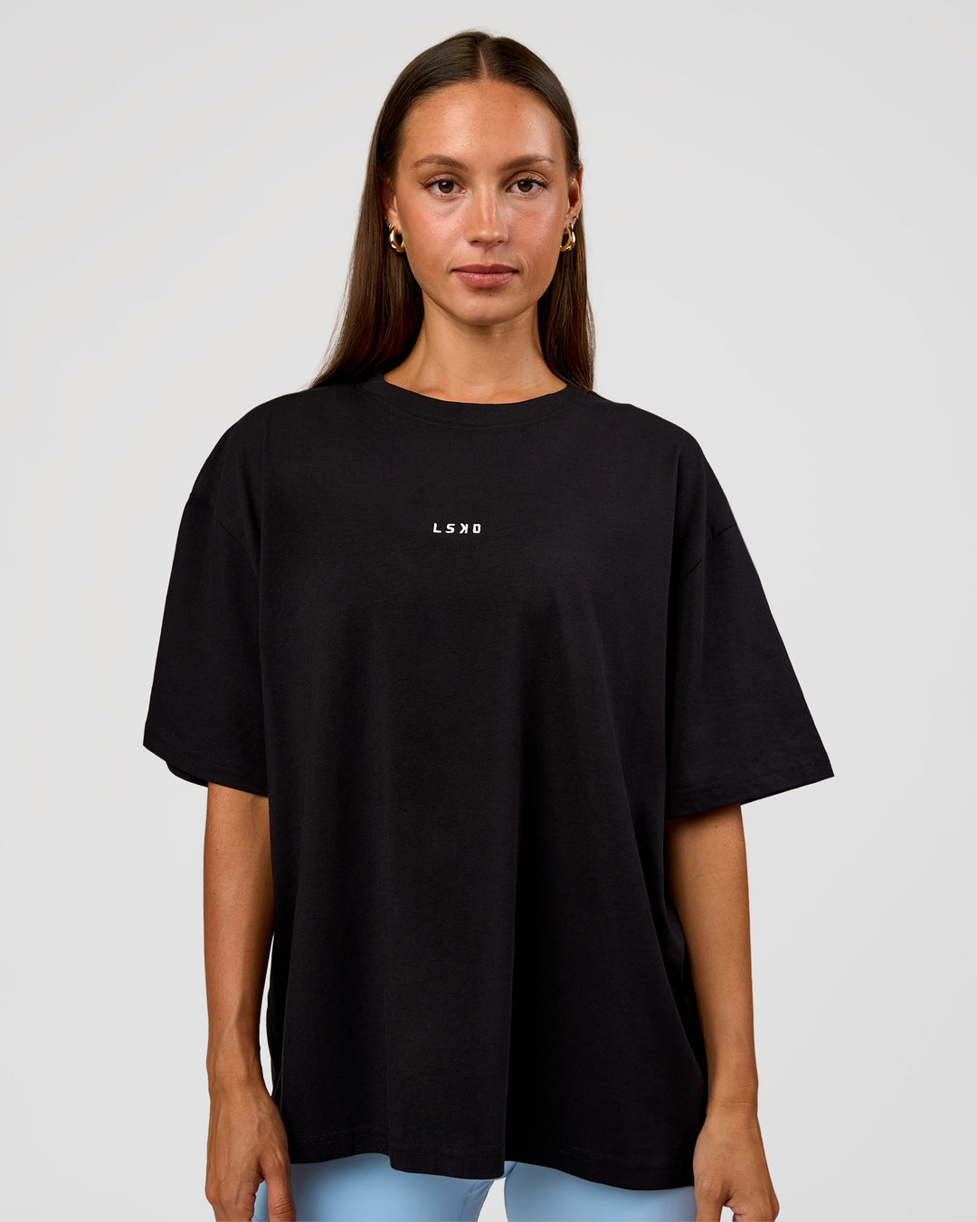 Woman wearing Go-To Break Through FLXCotton Oversized Tee - Black-Open Air | Model:Brylee | Size:XS - view 3