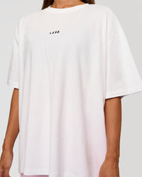 Woman wearing Go-To Break Through FLXCotton Oversized Tee - White-Marshmallow | Model:Brylee | Size:XS | Thumbnail Index: 3