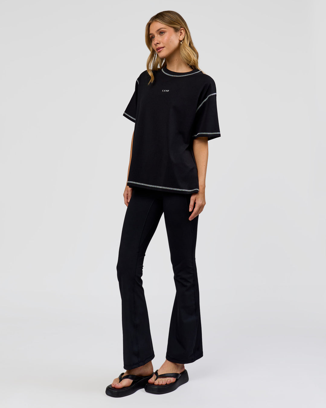 Woman wearing Go-To Contrast Oversized Heavyweight FLXCotton Tee - Black-White | Model:Leilani | Size:XS - view 4