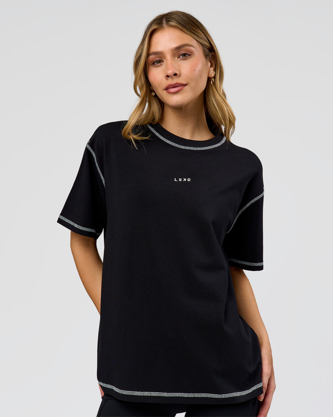 Woman wearing Go-To Contrast Oversized Heavyweight FLXCotton Tee - Black-White | Model:Leilani | Size:XS - view 1