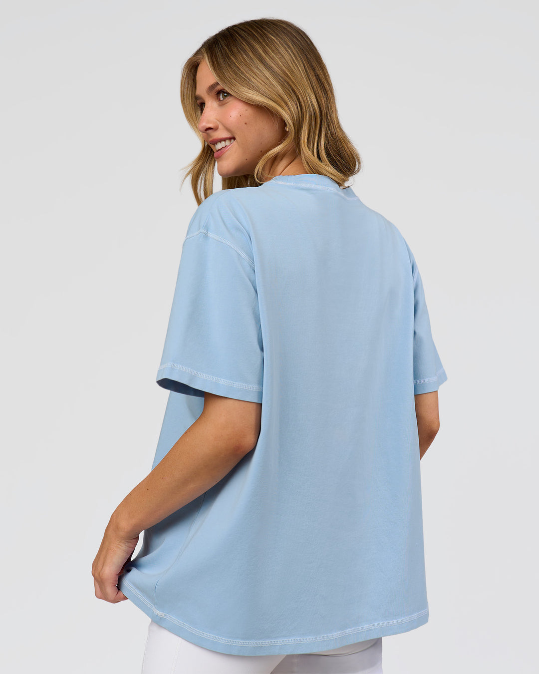 Woman wearing Go-To Contrast Oversized Heavyweight FLXCotton Tee - Open Air Washed-White | Model:Leilani | Size:XS - view 3