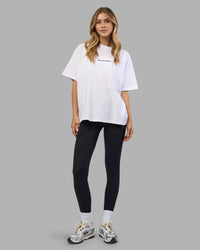 Woman wearing Go-To E.T.J FLXCotton Oversized Tee - White-Black | Model:Leilani | Size:XS | Thumbnail Index: 5