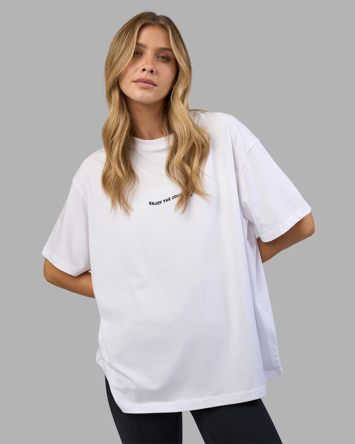 Woman wearing Go-To E.T.J FLXCotton Oversized Tee - White-Black | Model:Leilani | Size:XS