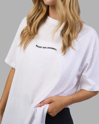 Woman wearing Go-To E.T.J FLXCotton Oversized Tee - White-Black | Model:Leilani | Size:XS | Thumbnail Index: 1