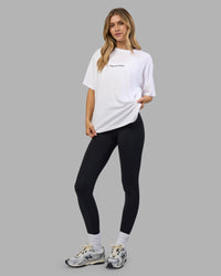 Woman wearing Go-To E.T.J FLXCotton Oversized Tee - White-Black | Model:Leilani | Size:XS | Thumbnail Index: 2