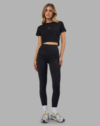Woman wearing Go-To FLXCotton Baby Tee - Black-White | Model:Leilani | Size:XS | Thumbnail Index: 3