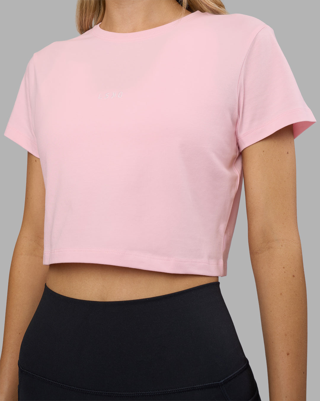 Woman wearing Go-To FLXCotton Baby Tee - Marshmallow-White | Model:Leilani | Size:XS - view 4