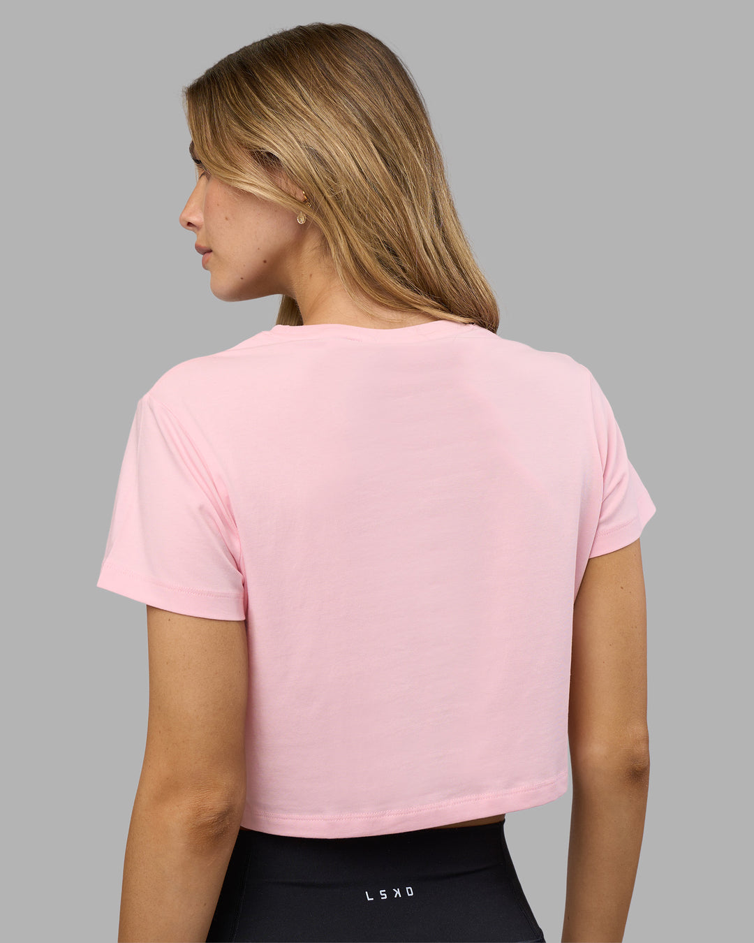 Woman wearing Go-To FLXCotton Baby Tee - Marshmallow-White | Model:Leilani | Size:XS - view 3
