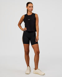 Woman wearing Go-To FLXCotton Midline Tank - Black-White | Model:Brylee | Size:XS | Thumbnail Index: 2