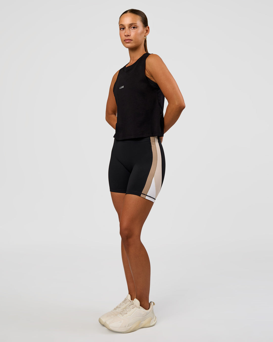 Woman wearing Go-To FLXCotton Midline Tank - Black-White | Model:Brylee | Size:XS - view 5