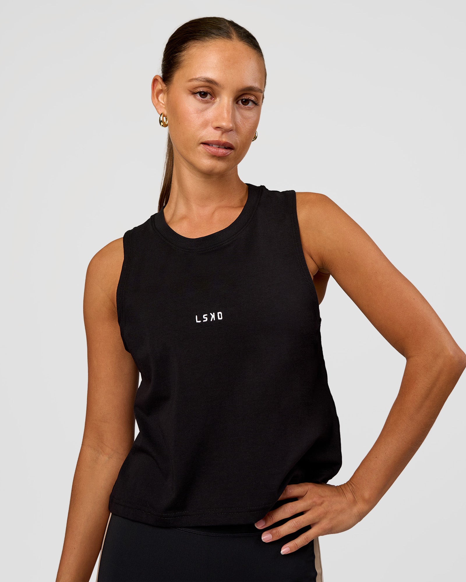 Woman wearing Go-To FLXCotton Midline Tank - Black-White | Model:Brylee | Size:XS