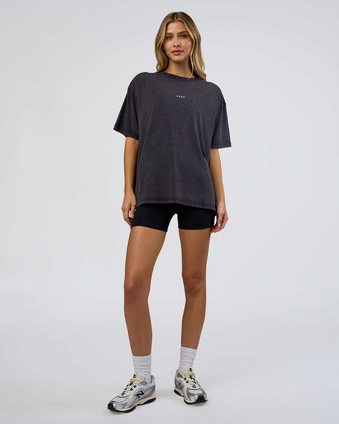Woman wearing Go-To FLXCotton Oversized Tee - Black Washed-White | Model:Leilani | Size:S - view 5