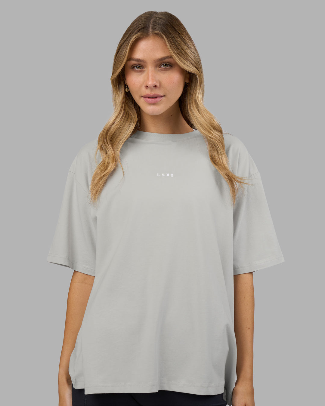 Woman wearing Go-To FLXCotton Oversized Tee - Digital Mist-White | Model:Leilani | Size:XS - view 2