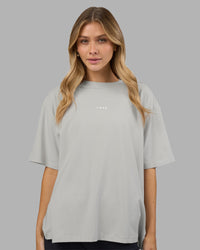 Woman wearing Go-To FLXCotton Oversized Tee - Digital Mist-White | Model:Leilani | Size:XS | Thumbnail Index: 1