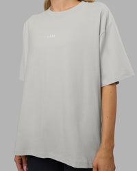 Woman wearing Go-To FLXCotton Oversized Tee - Digital Mist-White | Model:Leilani | Size:XS | Thumbnail Index: 4