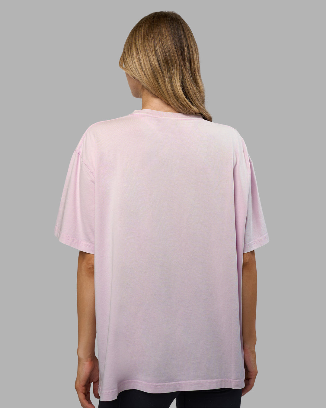 Woman wearing Go-To FLXCotton Oversized Tee - Fair Orchid Washed | Model:Leilani | Size:XS - view 3