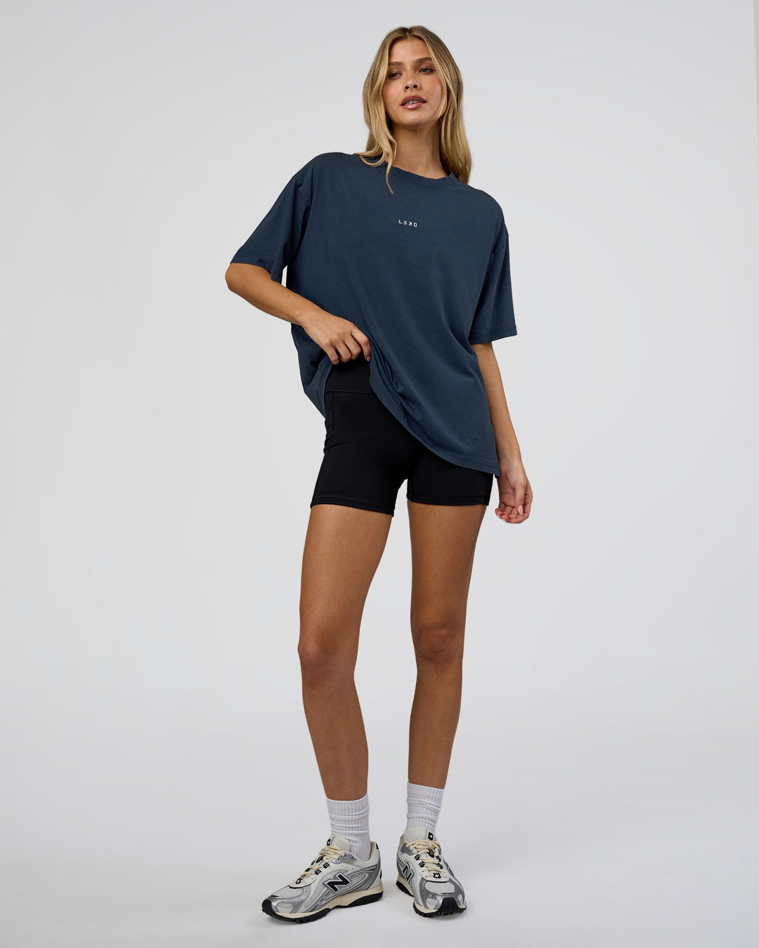 Woman wearing Go-To FLXCotton Oversized Tee - Future Navy Washed | Model:Leilani | Size:XS - view 4