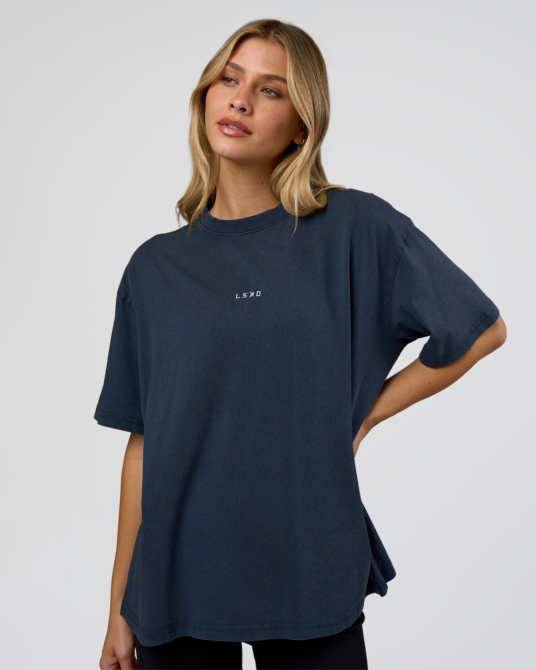 Woman wearing Go-To FLXCotton Oversized Tee - Future Navy Washed | Model:Leilani | Size:XS - view 1